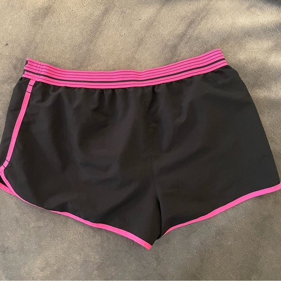 Under Armour Black and Pink Athletic Shorts with Curved Hem - Picture 3 of 3